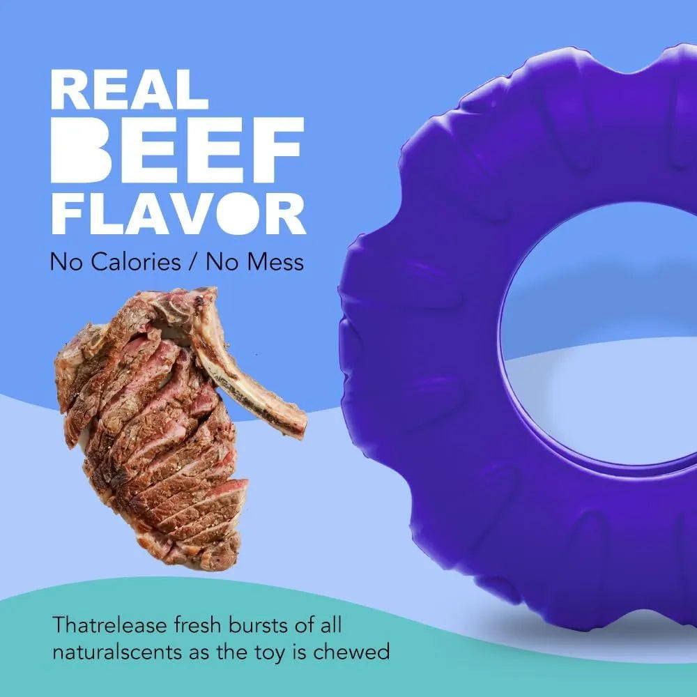 Blue rubber dog chew toy shaped like a tyre with oval openings for food dispensing, measuring 11cm by 4cm