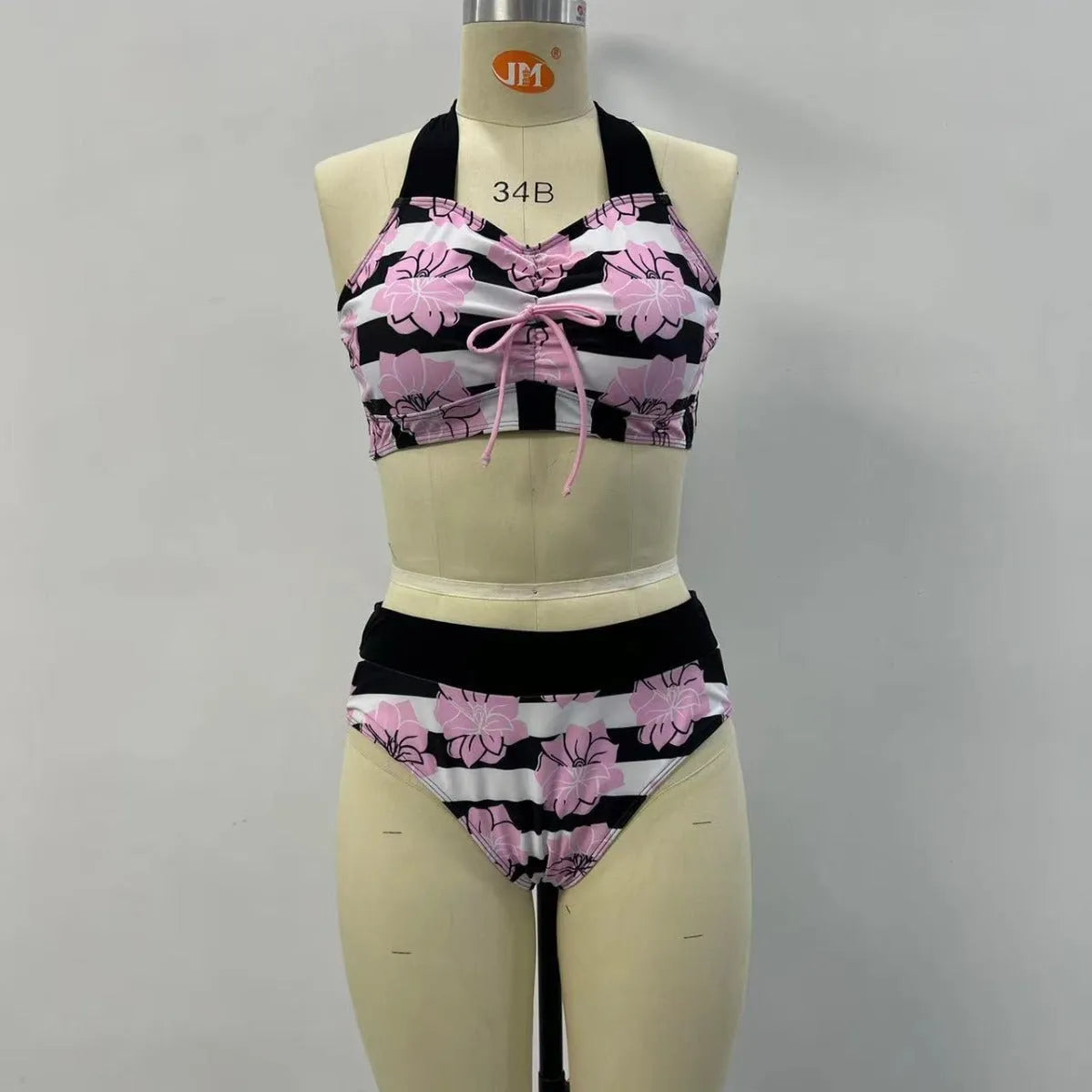 Black women's split bikini with belly-covered slimming design for swimming.