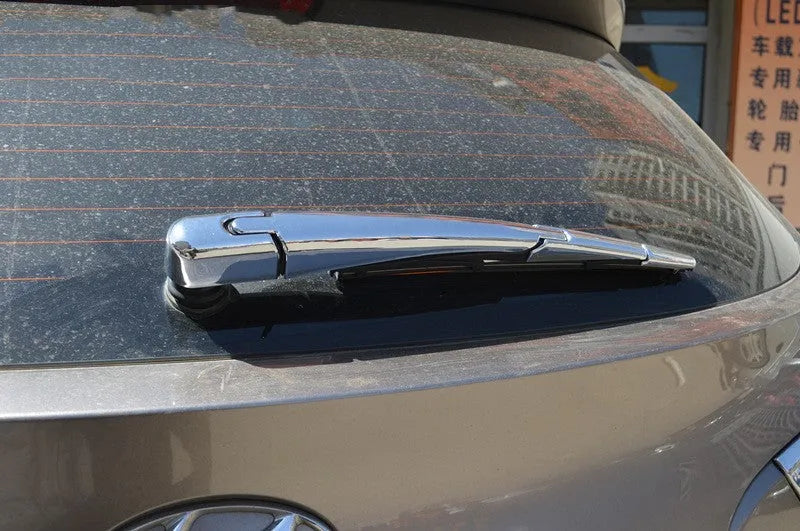 Four silvery ABS plastic rear wiper cover trims for Hyundai 2010 models on white background