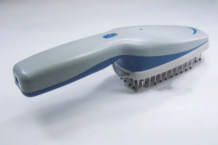 Pet comb with ion technology, 21.5cm length, removable brush head, and 78 teeth for grooming and odour removal