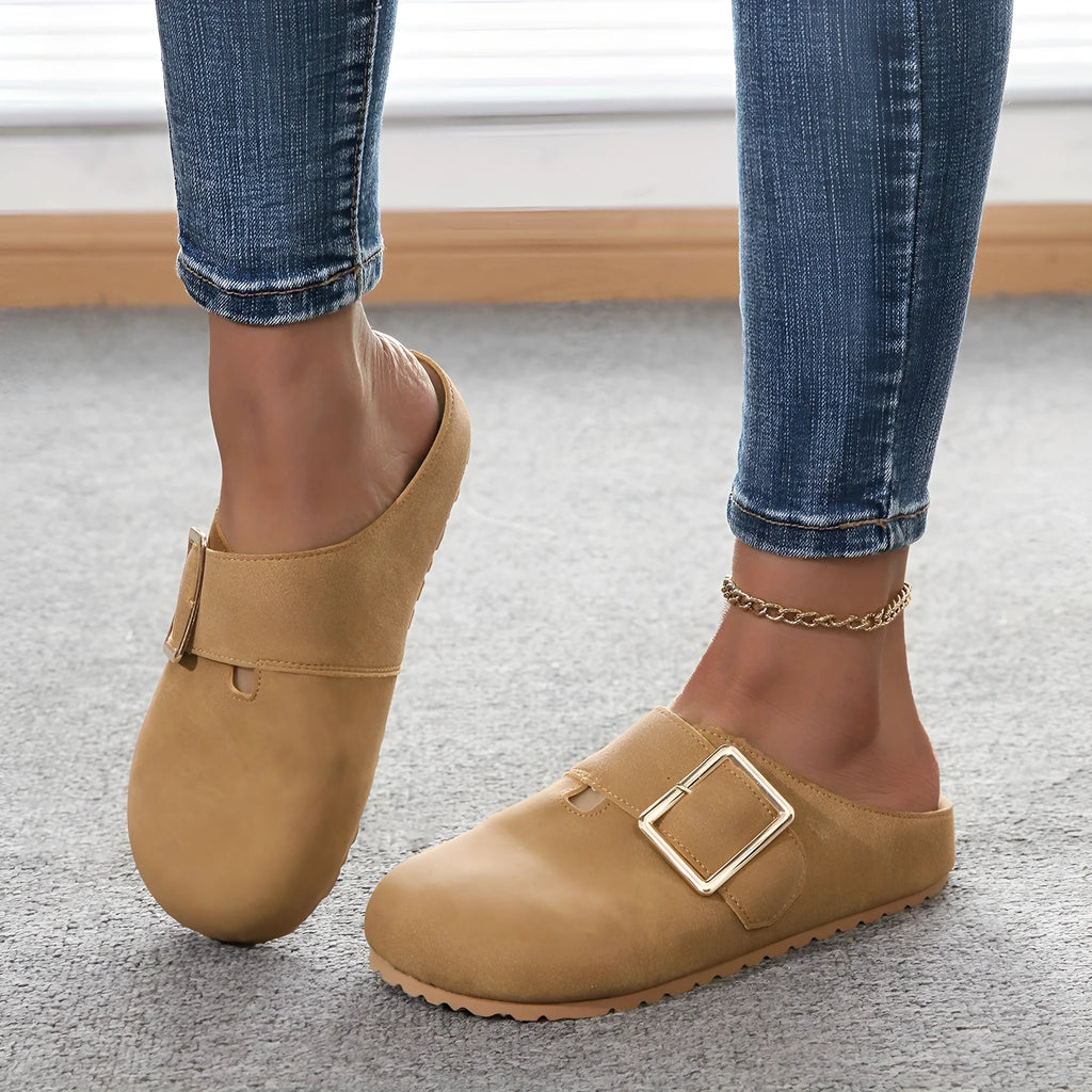 Women's low-top canvas slippers in apricot colour with closed toe and cushioned sole.