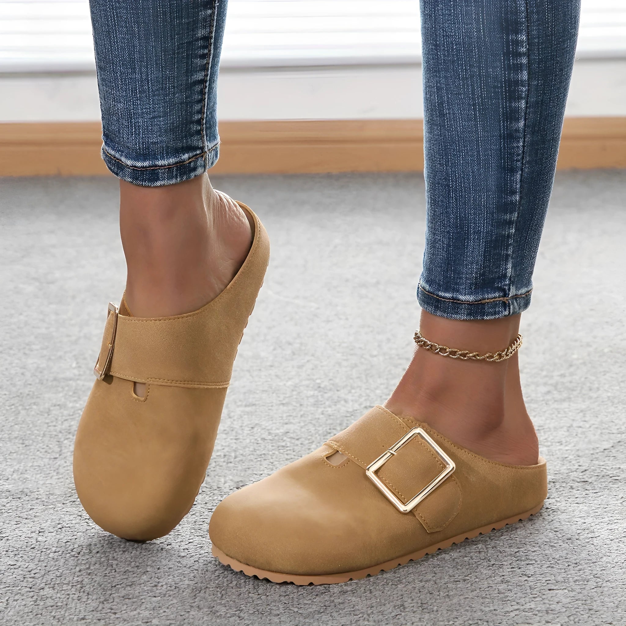 Women's low-top canvas slippers in apricot colour with closed toe and cushioned sole.
