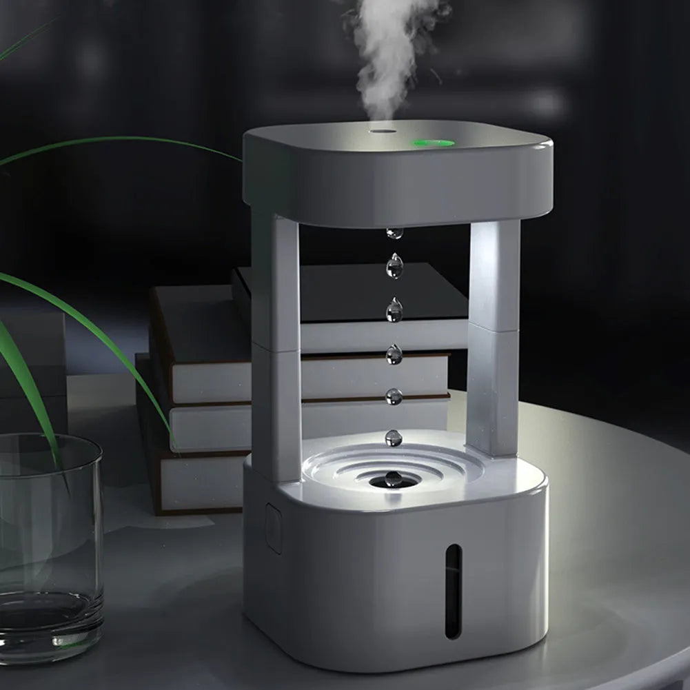 White anti-gravity water drop humidifier with floating droplets illusion and USB cable