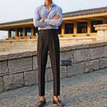 Straight-leg business trousers in black, white, or apricot with polyester construction for office wear
