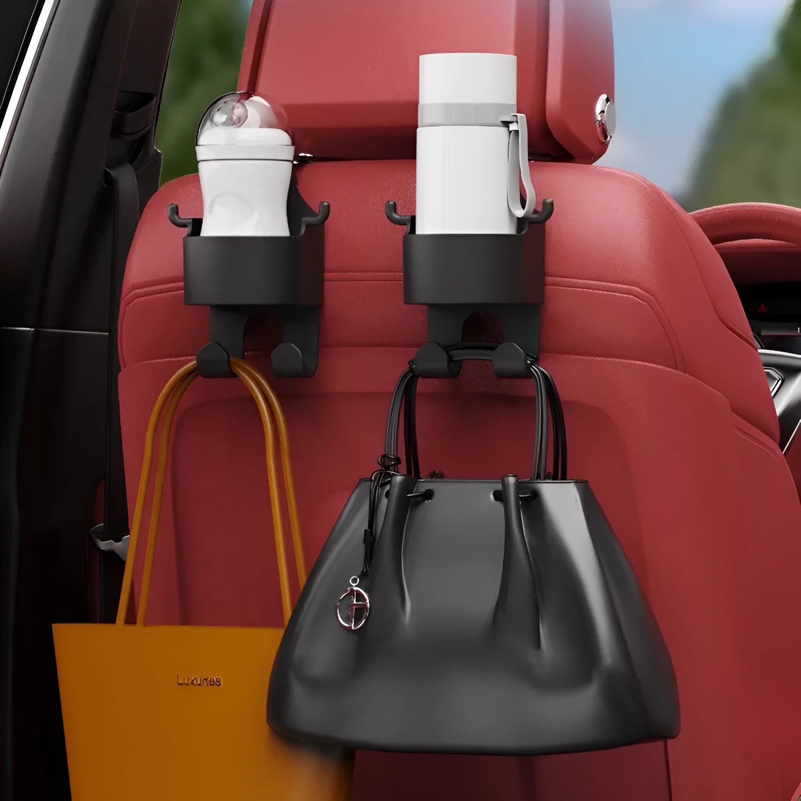 Black plastic car seat back organiser with cup holder and hook.