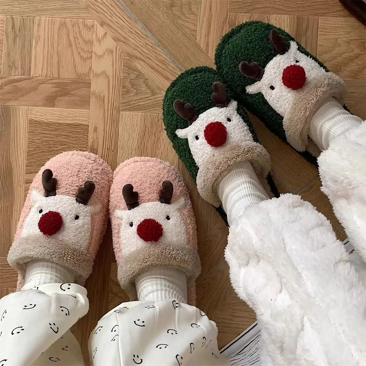 Women's green plush Christmas slippers with an elk design and a non-slip PVC sole.
