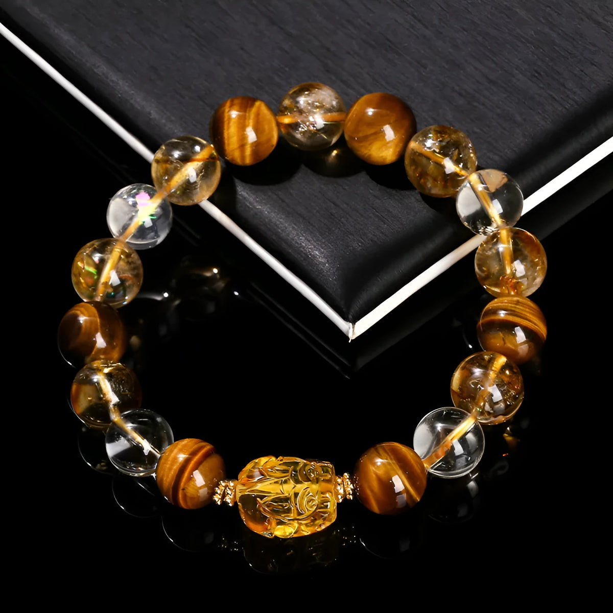 Yellow tiger's eye and citrine bracelet with 10mm round beads, pi xiu charm, and steel fittings
