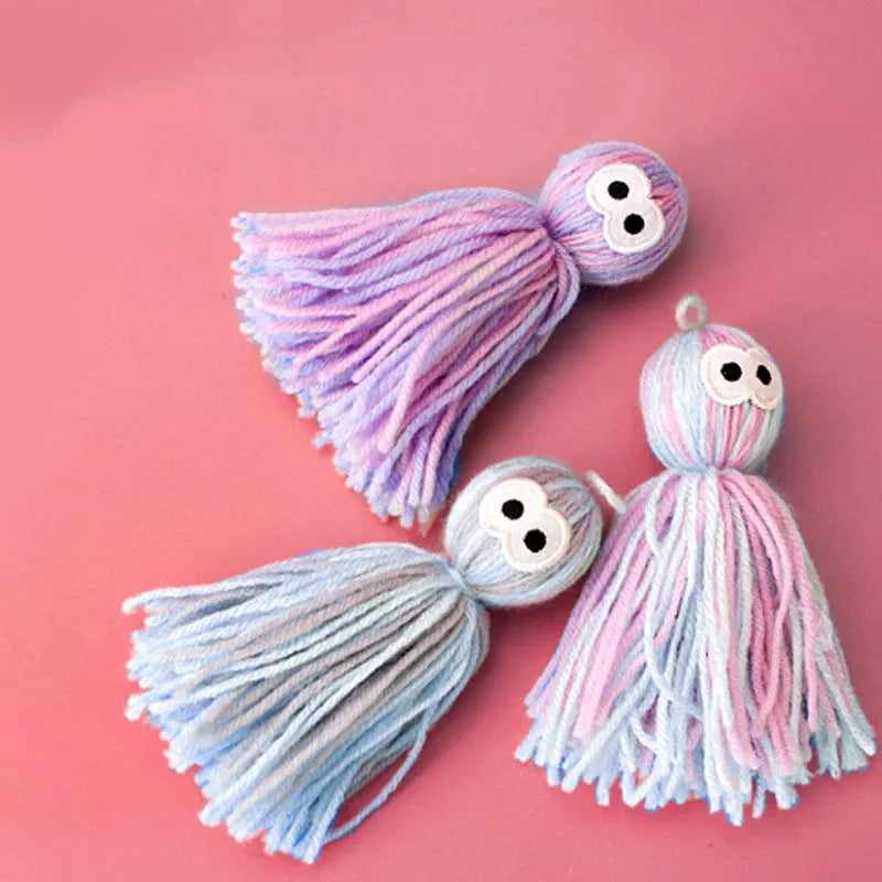 Cat toy wool ball measuring 10x13x4cm with hanging cord and teaser stick attachment in three colour options