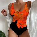 Women's tight 3D printed one-piece swimsuit in orange red, made from Lycra for swimming.