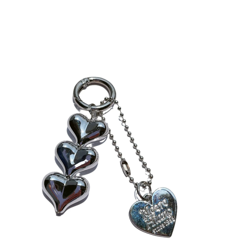 Love heart shaped acrylic charm keychain on an electroplated metal ring in silver finish.