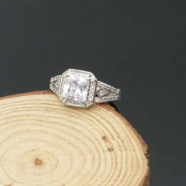 Geometric hollow zircon ring for women in platinum colour with quadrilateral design and inlaid stones