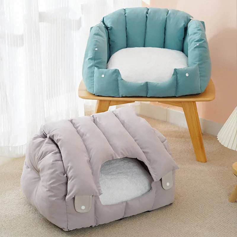 Dual-purpose arched pet bed showing enclosed cat nest section and open sofa-style area