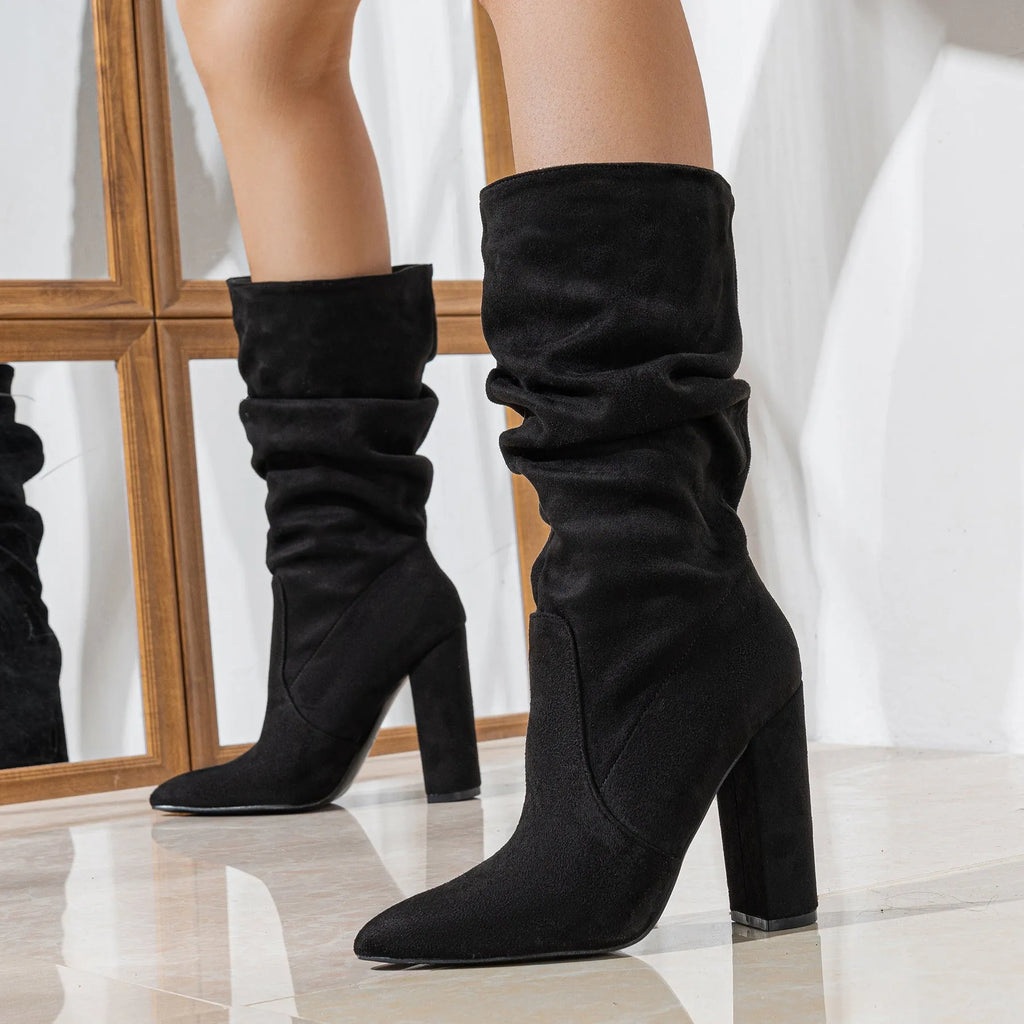 Women's chunky heel pointed-toe suede boots in black colour with 8cm+ heel height and middle calf length