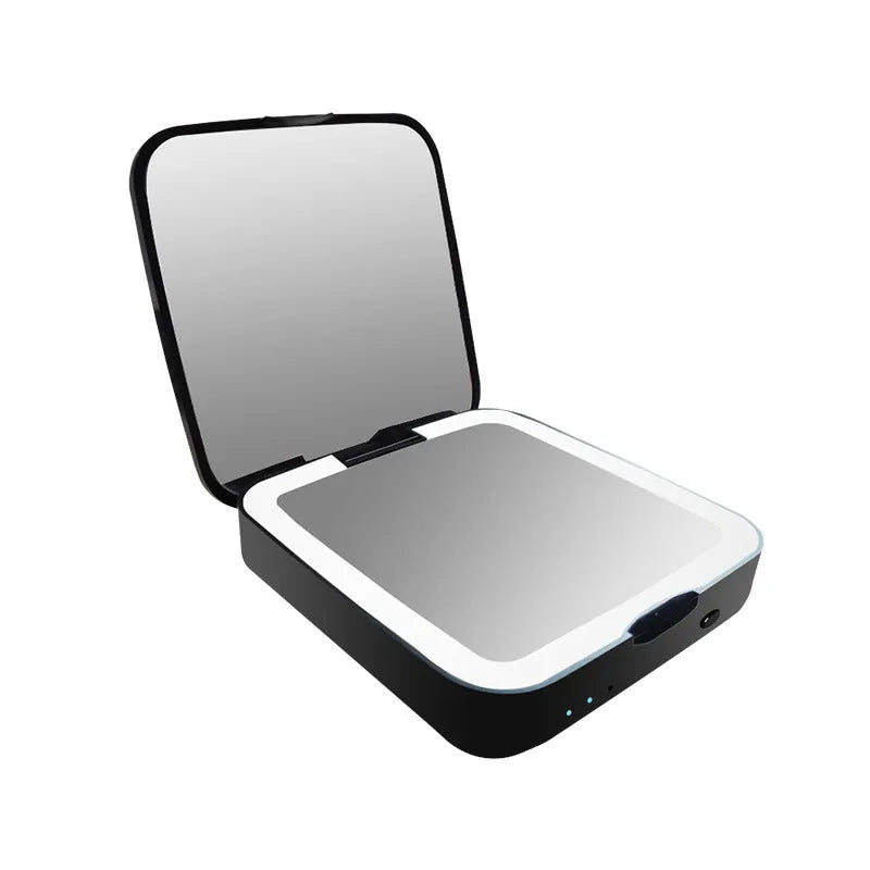 Black lighted makeup mirror with dual magnification showing 4x and HD sides, adjustable lighting controls visible