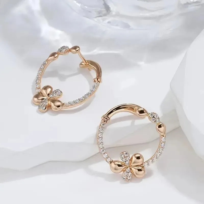 A pair of round geometric hoop earrings for women made from electroplated copper.