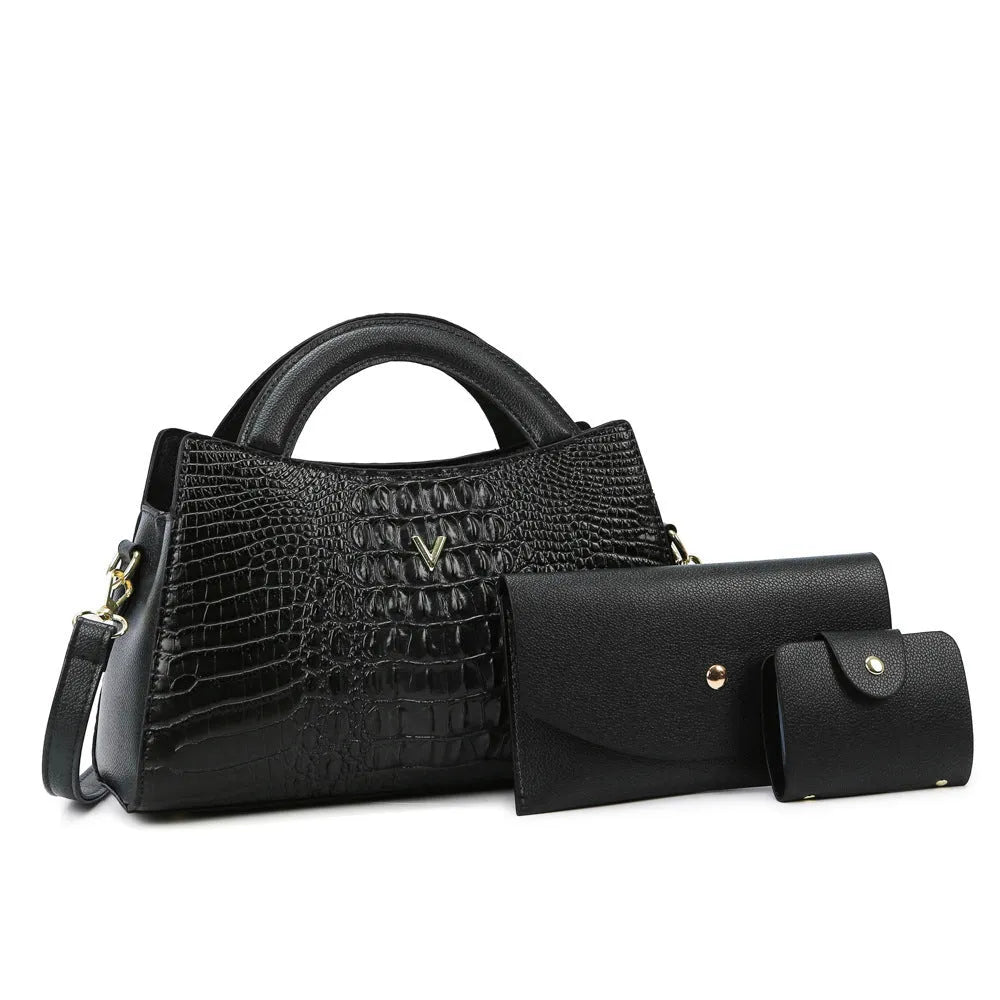 Women's black crocodile pattern crossbody bag with adjustable strap and front sandwich pocket.