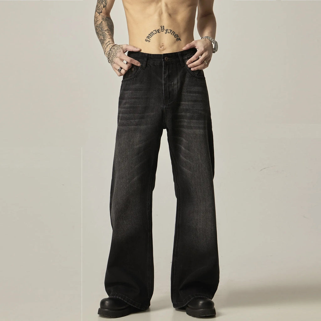 Black loose straight jeans with zipper fly on mannequin showing retro style and structured fit
