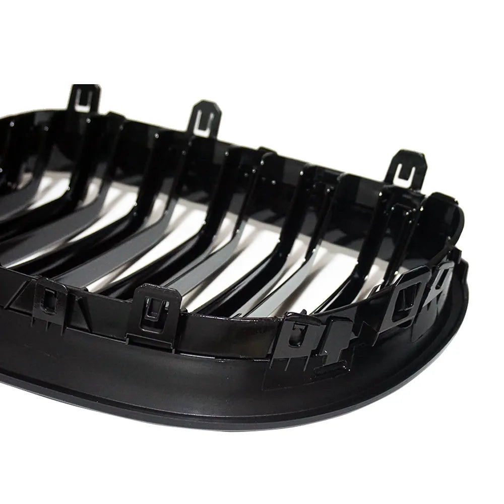 BMW E60 E39 front grille set with carbon fibre finish on black ABS plastic.