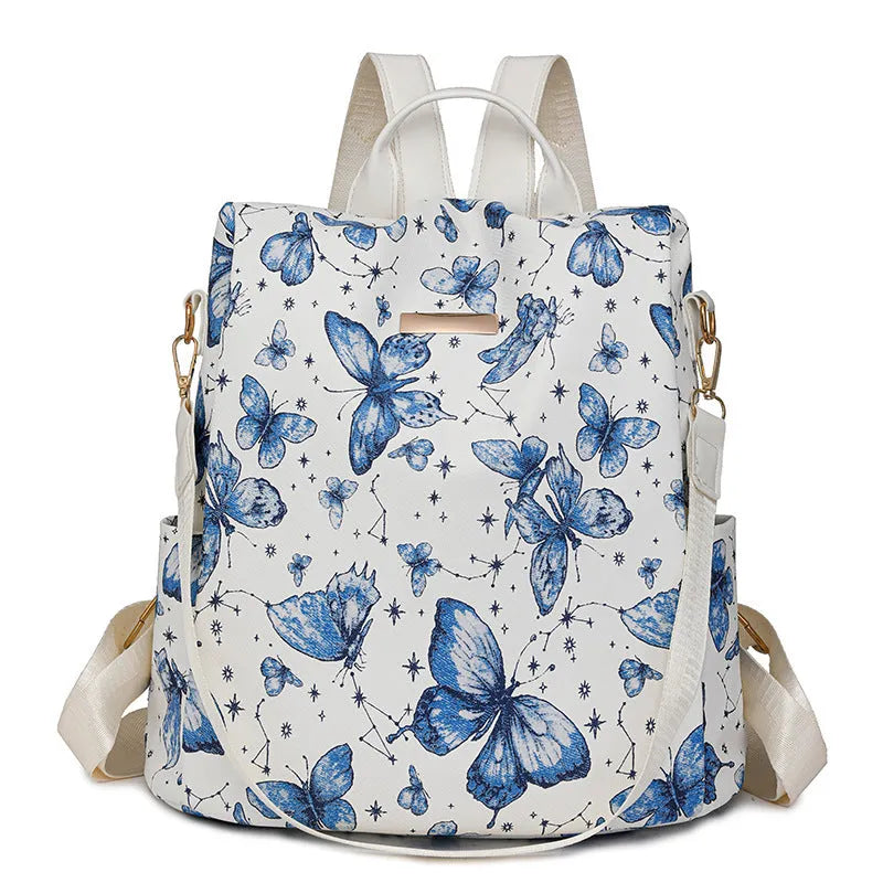 Butterfly printed black PU leather backpack with visible sewing lines and a physiological curve backplate.