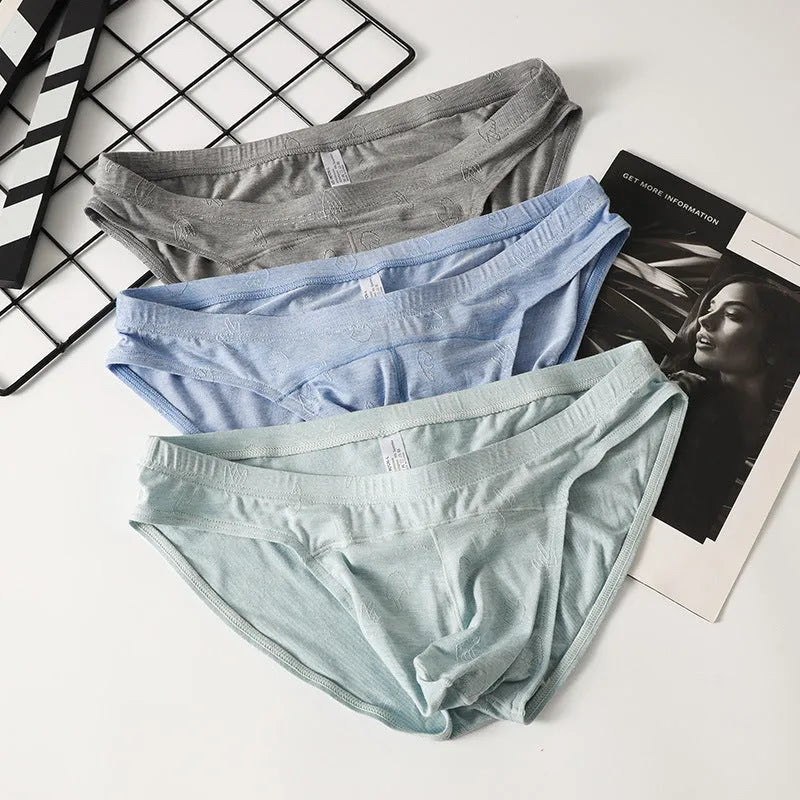 Women's low-waist modal briefs in colourful blue with jacquard knit detail.