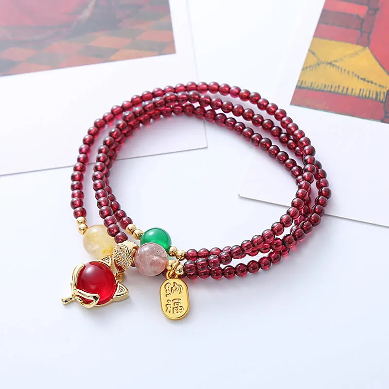 Purplish red garnet fox charm adjustable bracelet for women on rope cord