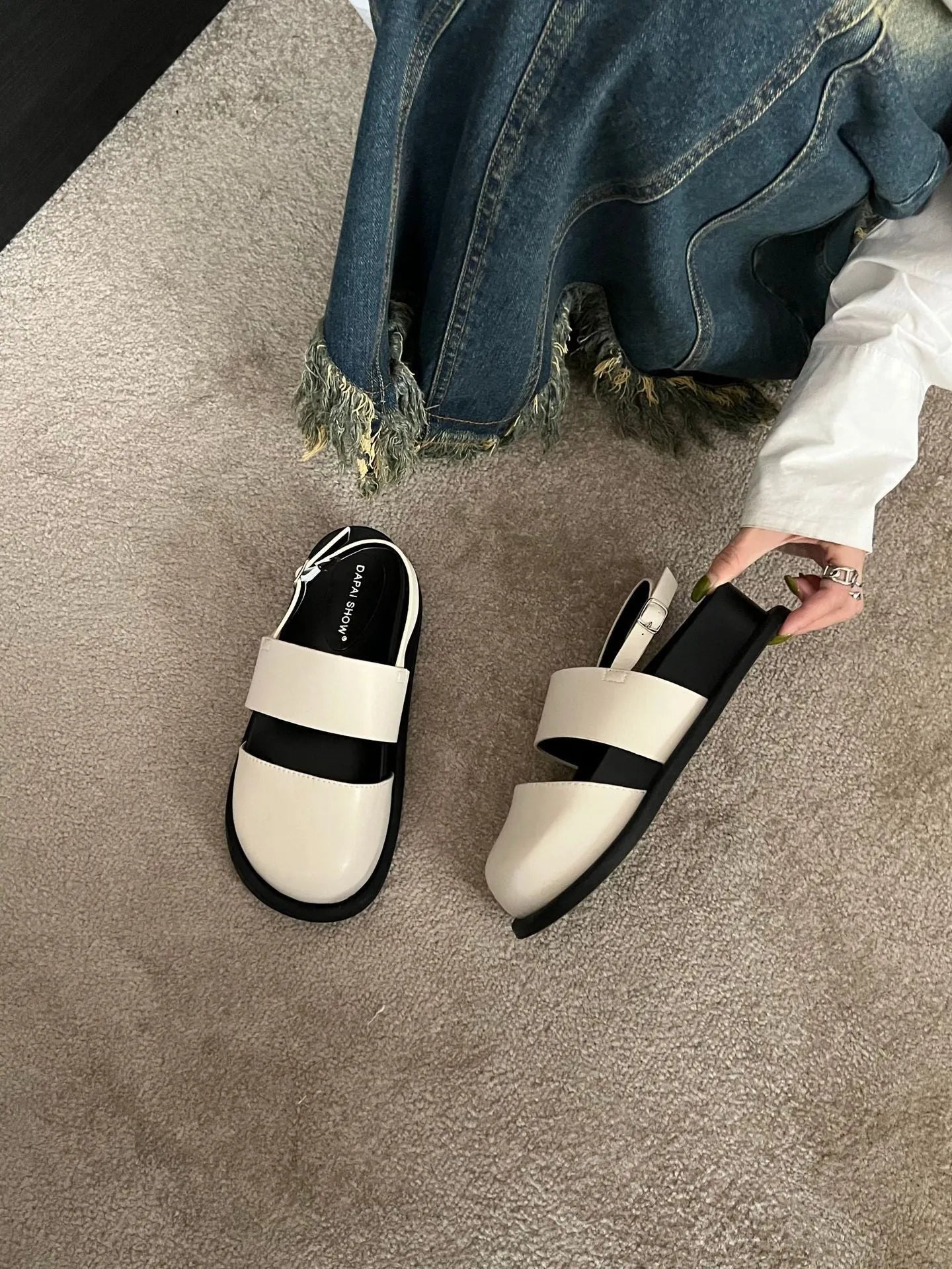 Retro raised sole sandals with ankle-strap buckle in black microfiber