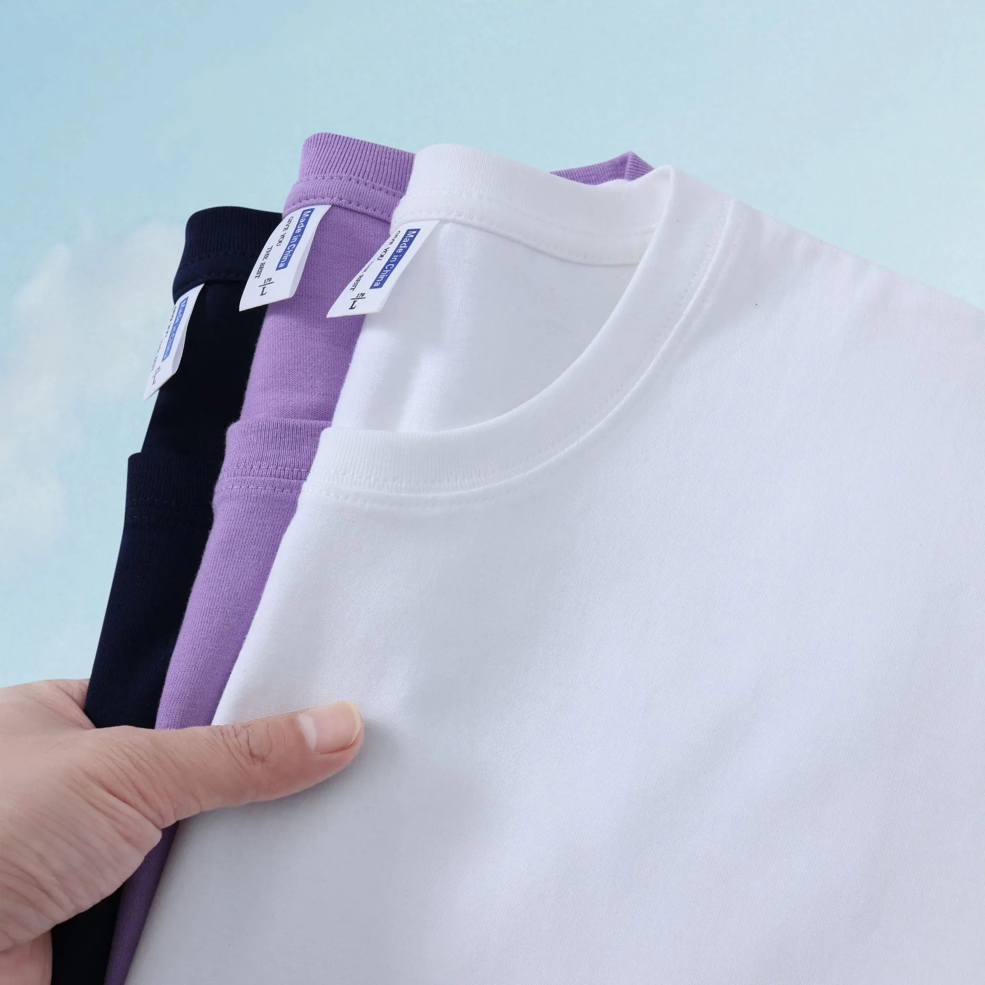 Unisex loose fit cotton t-shirt in multiple solid colours with short sleeves for summer wear