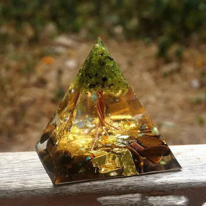 6cm crystal epoxy pyramid decoration with natural gravel visible through transparent resin in Lapis lazuli blue colour
