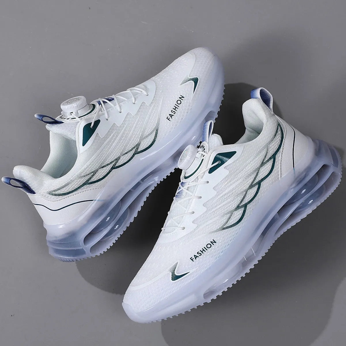 White low-top mesh trainers with rotating button lace-up and rubber soles for sports and casual use