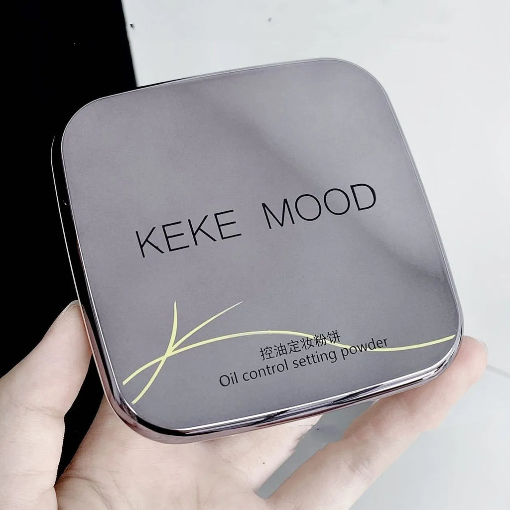 Open compact of oil control pressed face powder showing natural matte finish in pan.