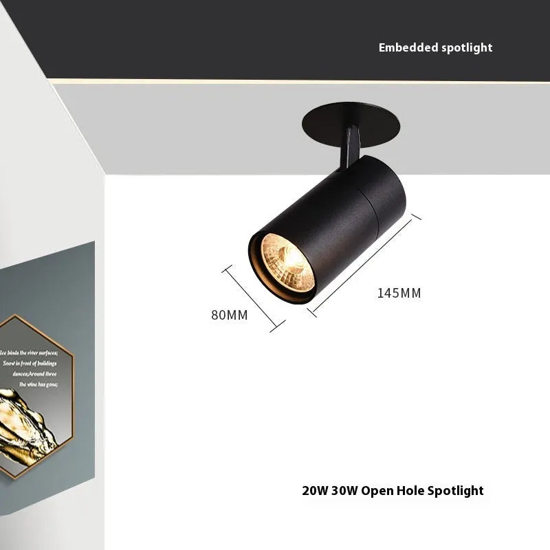 Black and white aluminium embedded cylinder track spotlight for recessed ceiling installation in 55-75mm hole.