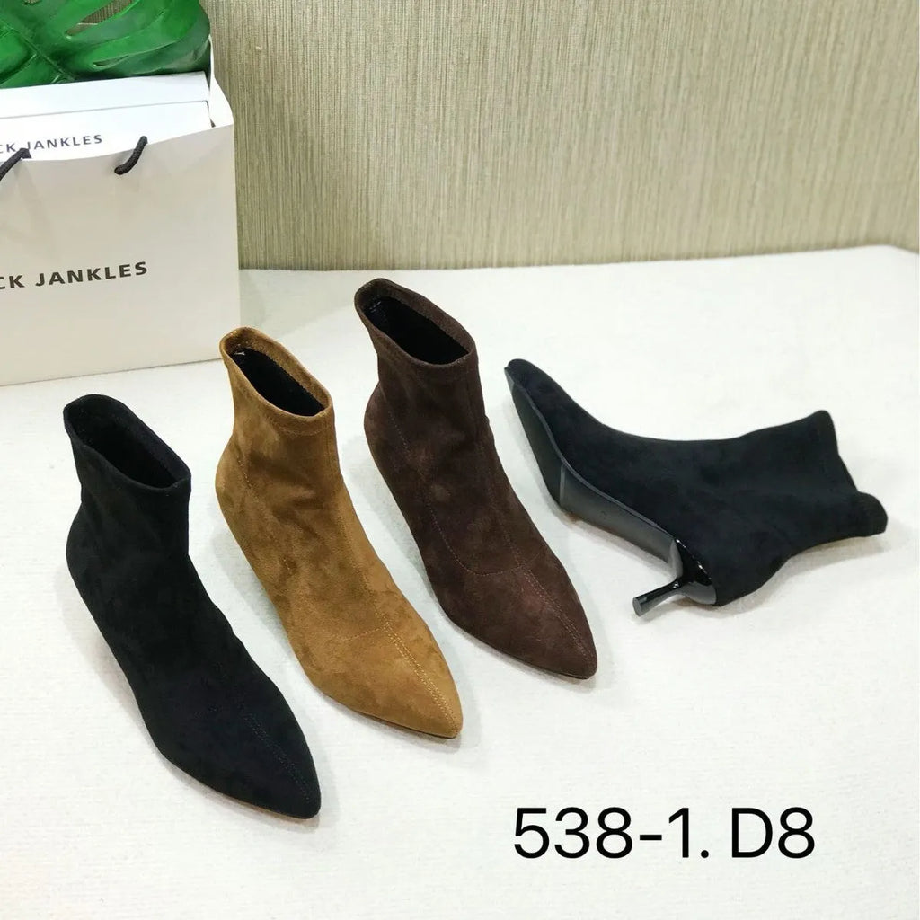 Women's black pointed toe ankle boots with a high stiletto heel on a microfiber upper.