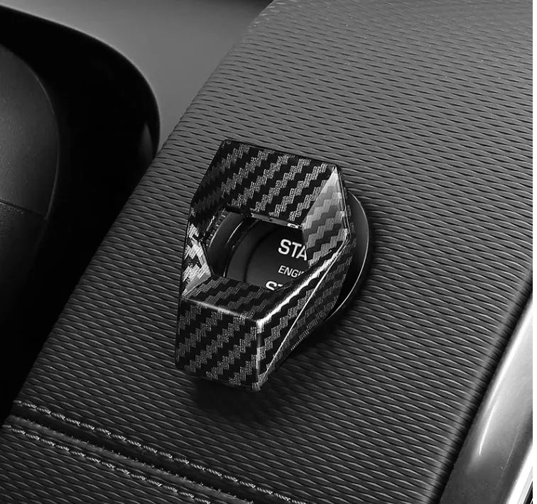 Set of eight aluminium alloy steering wheel button stickers in brushed red, silver, and blue finishes