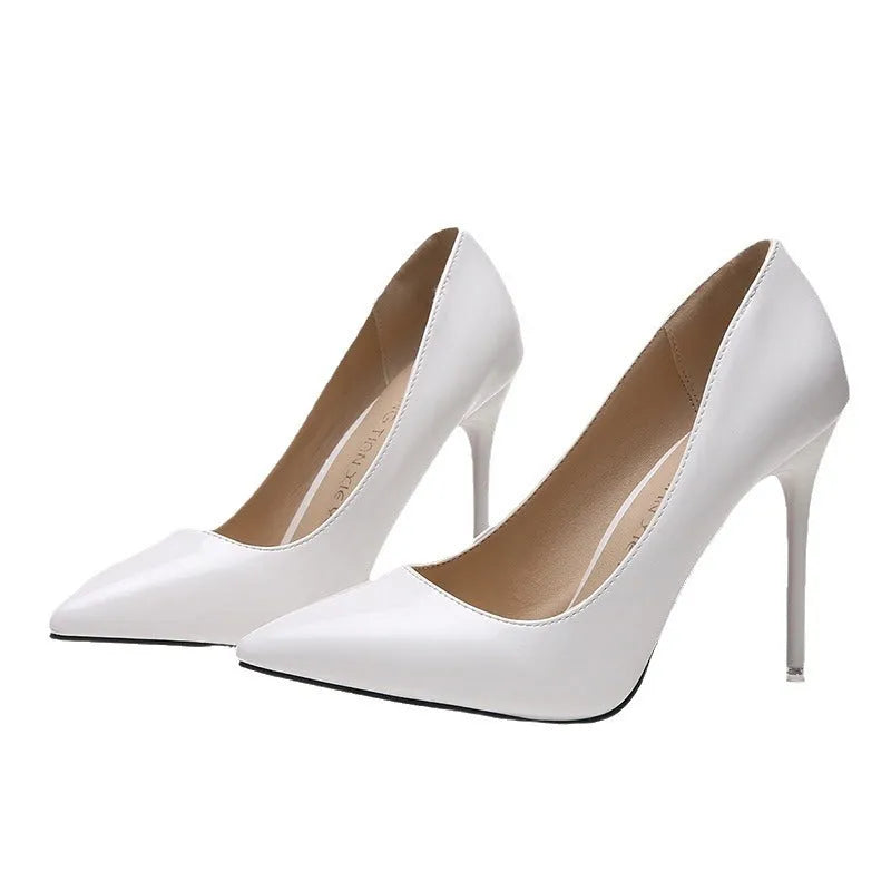 Women's pointed-toe stiletto high-heel pumps in apricot colour on a white background.