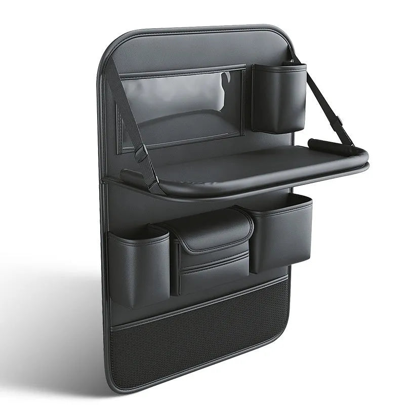 Black leather car seat storage bag with a foldable dining table deployed, hanging behind a car headrest