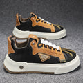 Men's beige low-top sneakers with elastic band closure and microfiber upper for casual wear.
