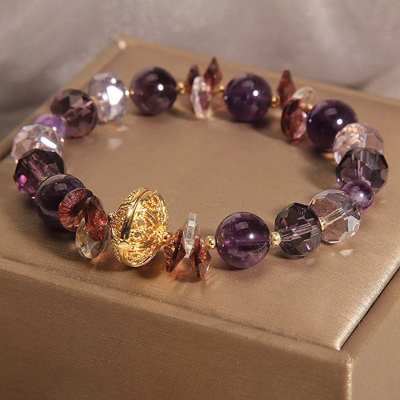Purple crystal bracelet with pumpkin beads and rhinestone details for women