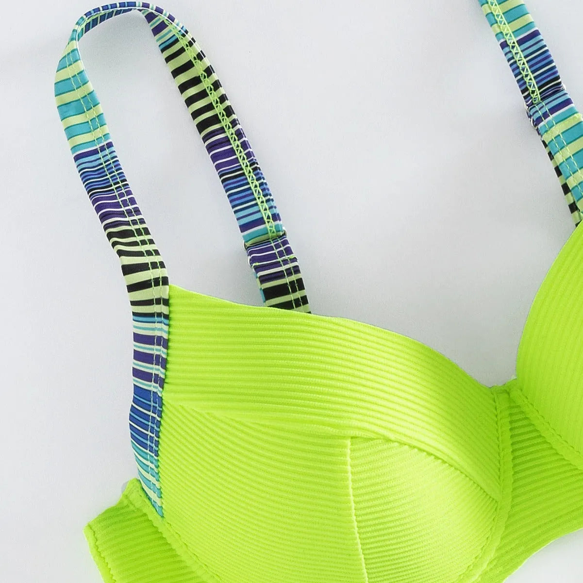 Green printed halter bikini set for women on a white background.