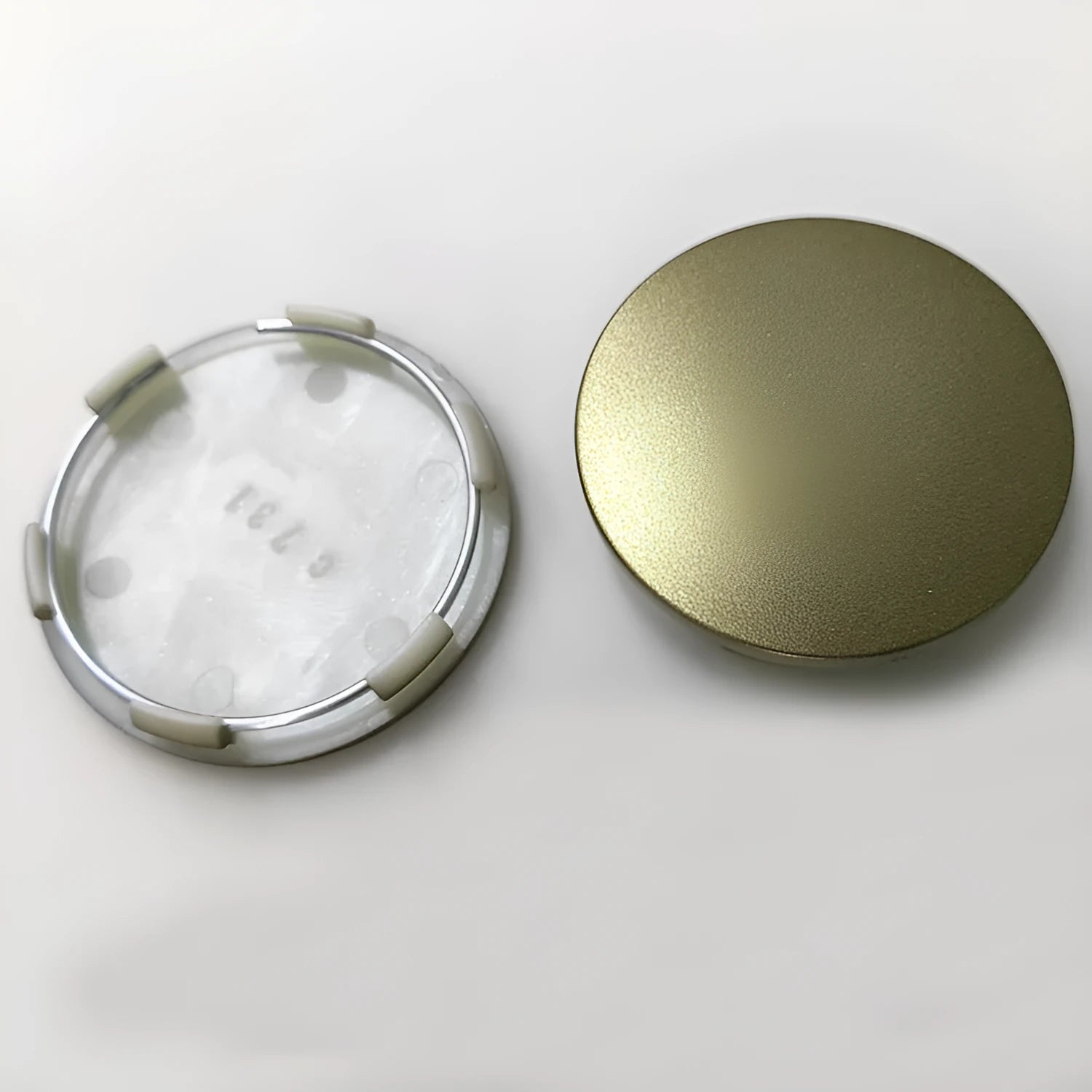 65mm ABS plastic car hub centre cover in antique copper or silver finish with steel ring.