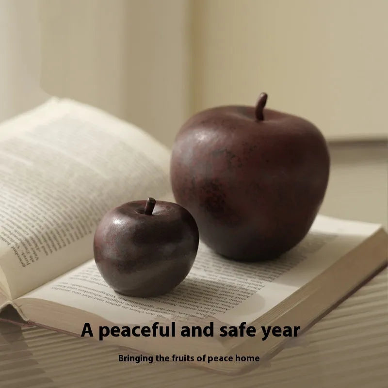 Retro Chinese ceramic simulation apple ornament on desktop, showing authentic details and ceramic construction