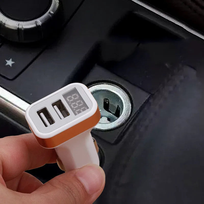 Gold digital display car charger showing voltage reading with USB port for device charging