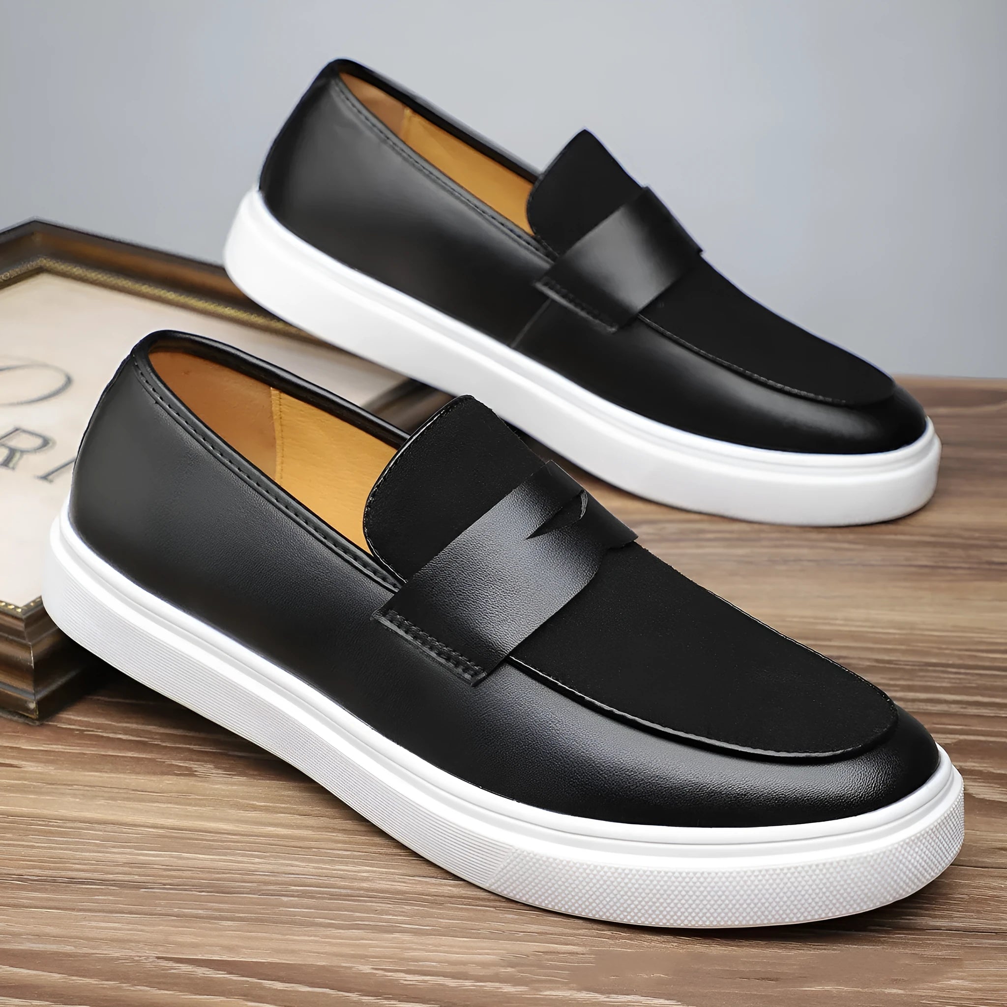 Men's black slip-on casual shoes with tassel decoration and round toe