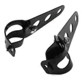 A pair of black iron motorcycle headlamp support brackets for retro modification.