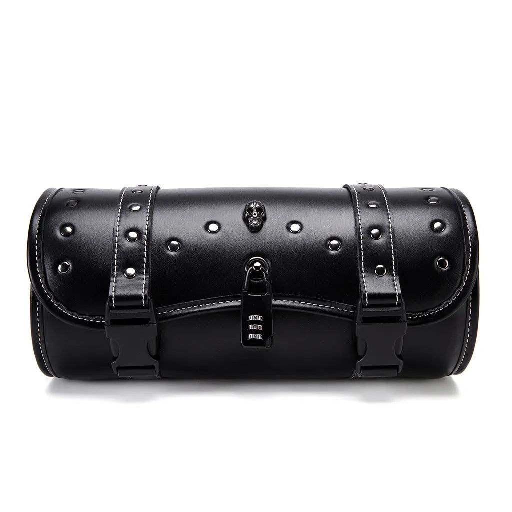 Black PU motorcycle pannier bag with punk retro styling mounted on a custom bike.
