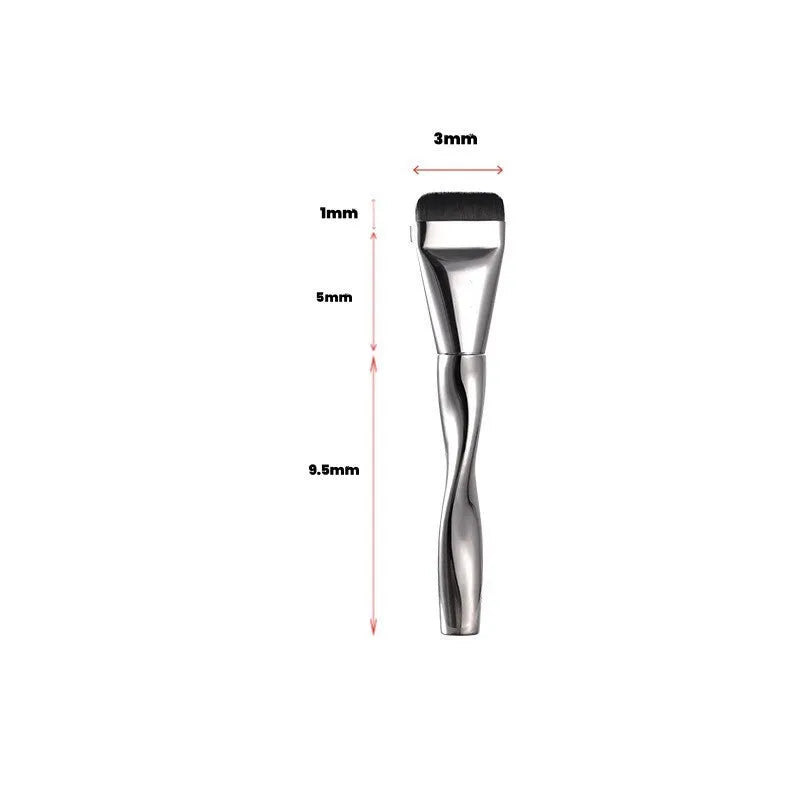Spiral-shaped black powder foundation brush with long handle and separate makeup puff in packaging