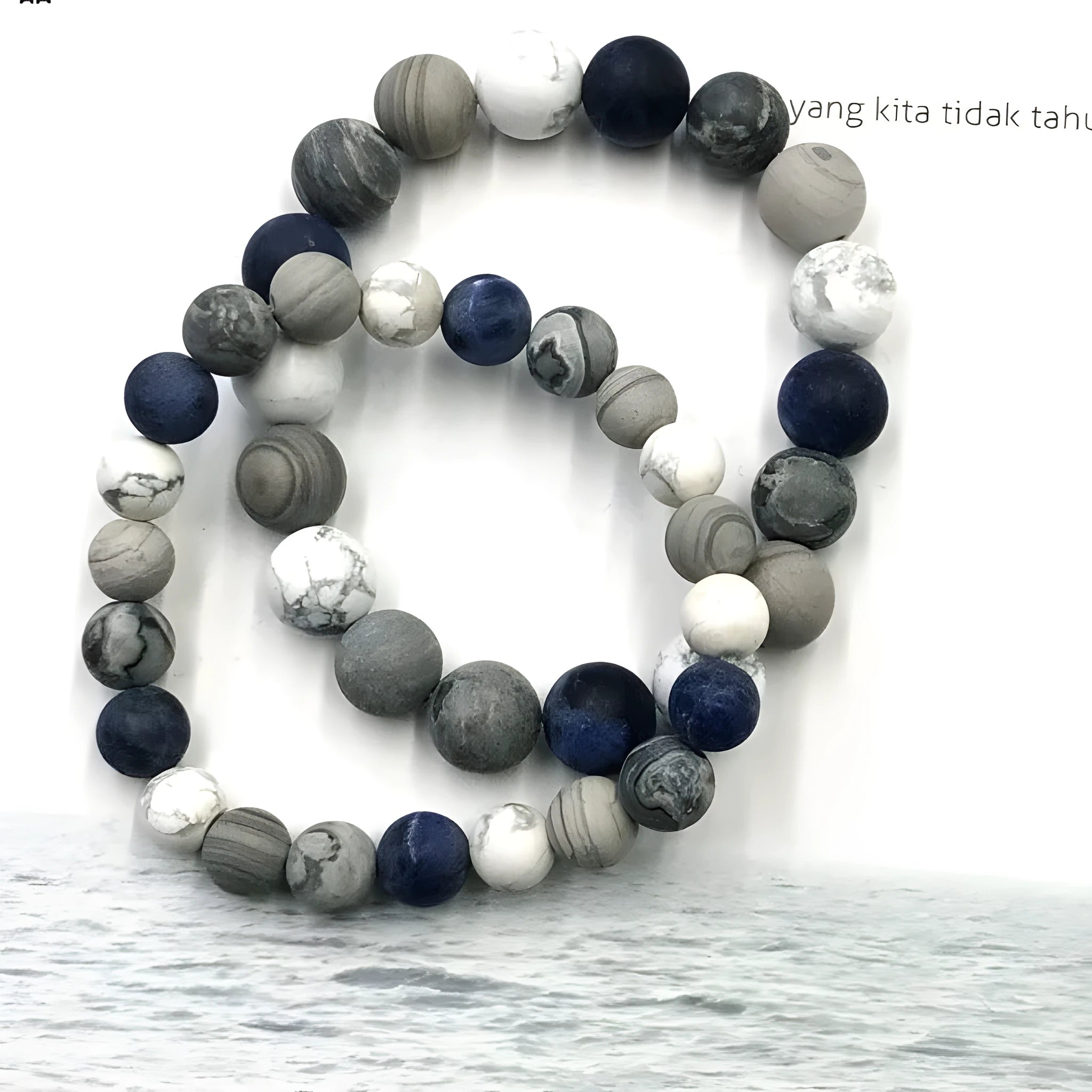 Handmade planet stone bracelet with universe wind pattern showing U-shaped design