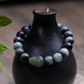 Black Eagle Eye Stone bracelet with Hetian Jade Pixiu charm and 10mm beads