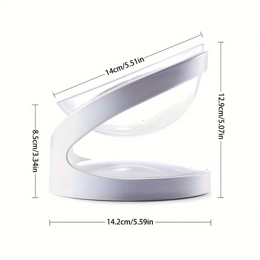 Clear elevated cat food bowl with 15-degree tilt angle on white surface