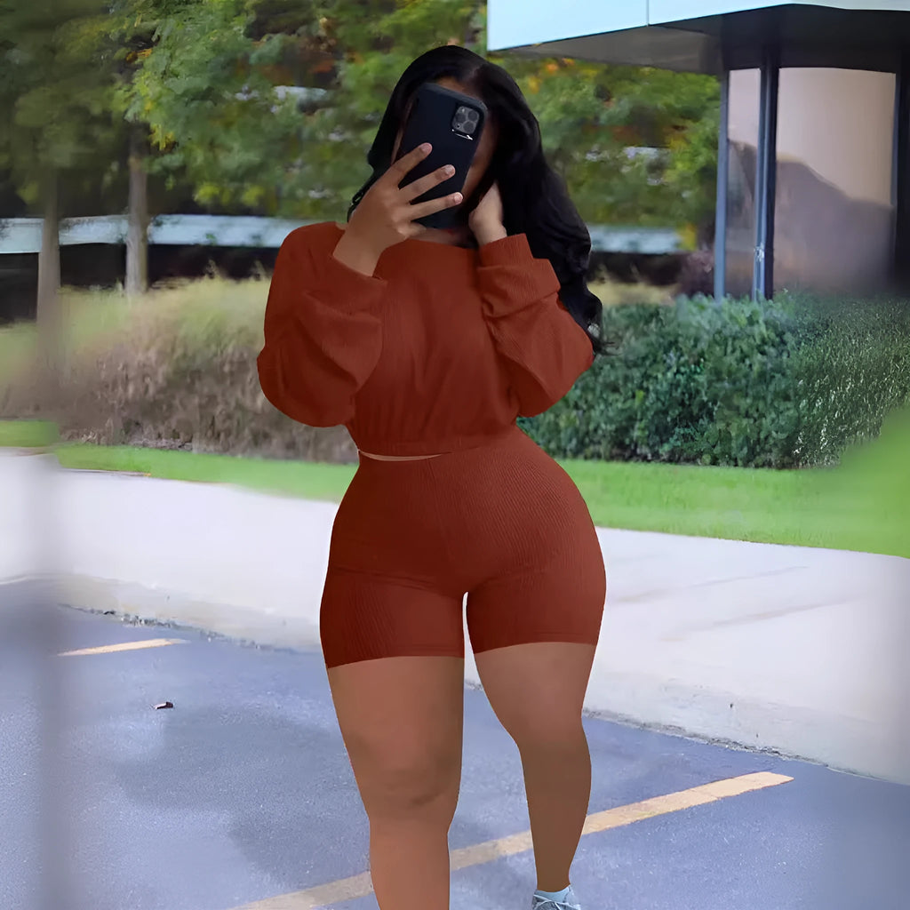Women's solid colour off-the-shoulder long sleeve top and shorts two-piece set.