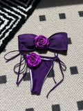 Women's solid colour polyester swimsuit with drawstring straps on a tube top